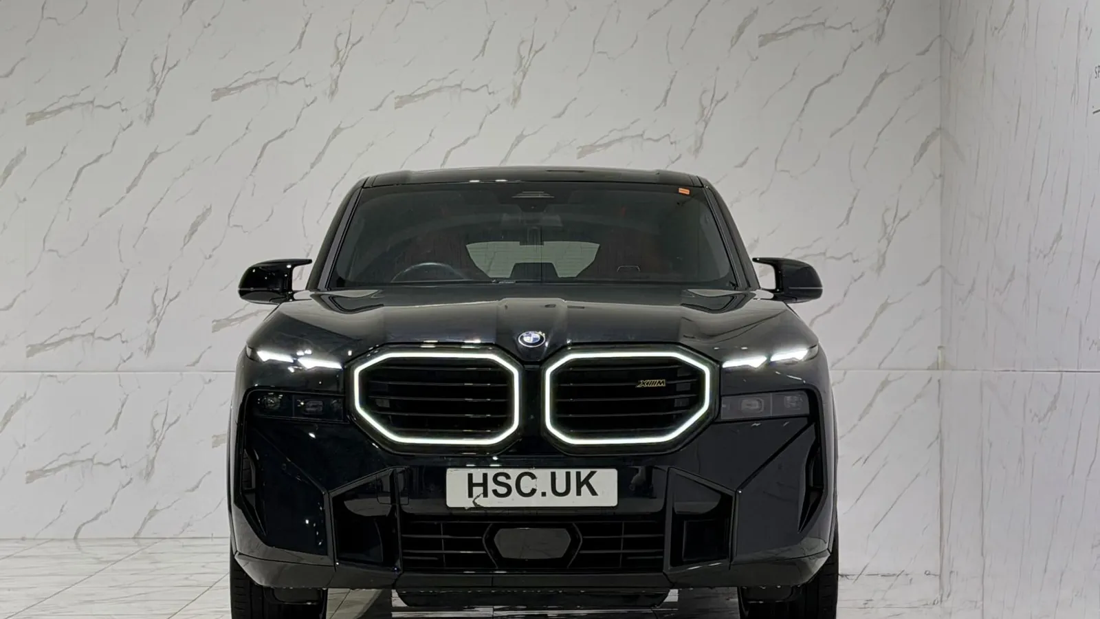 2024 BMW XM — Head-on view of the grille and headlights