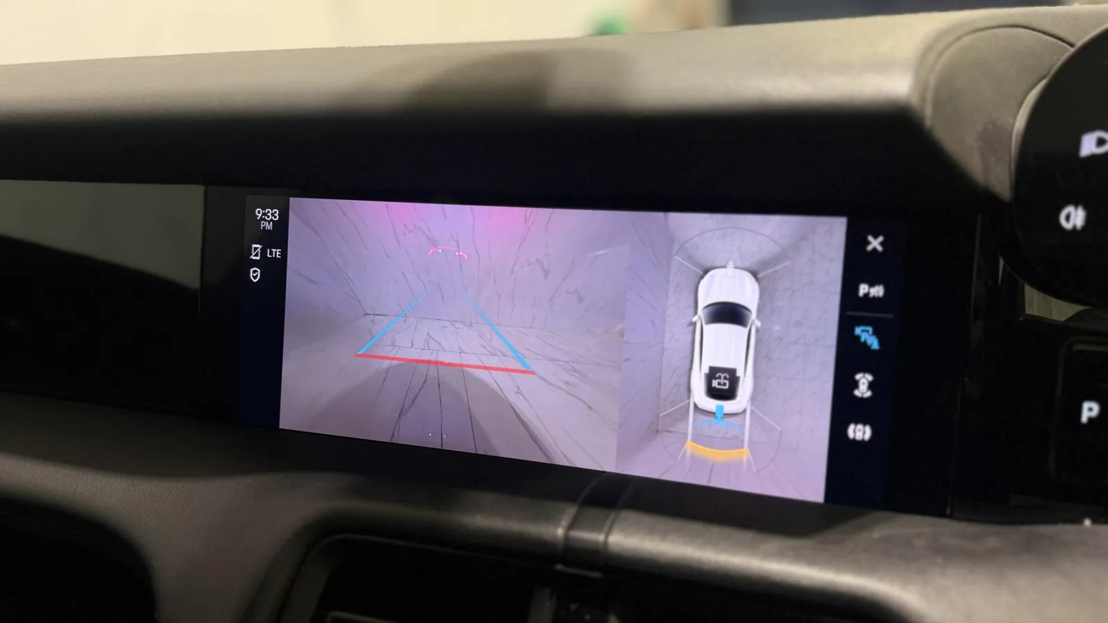 2021 Porsche Taycan — Centre screen showing the reversing camera and overhead view
