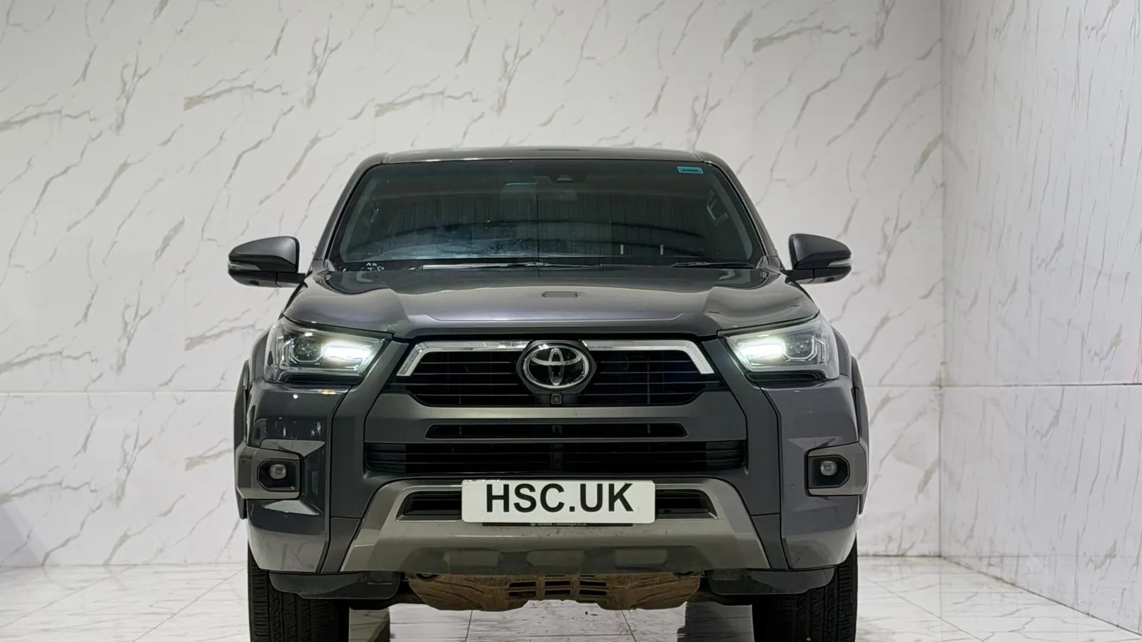 2023 Toyota Hilux — Head-on view of the grille and headlights