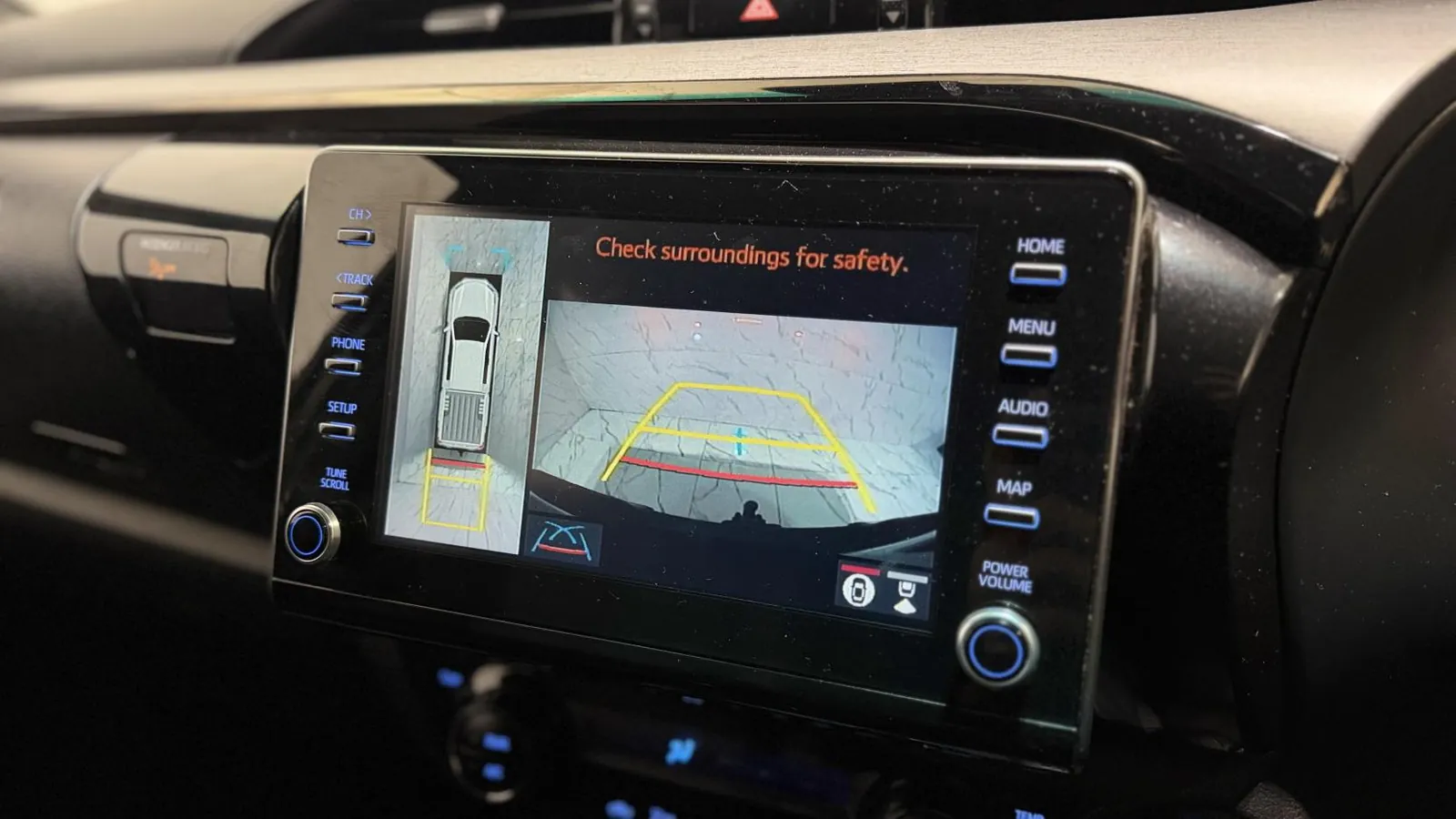2023 Toyota Hilux — Centre screen showing the parking camera and overhead view