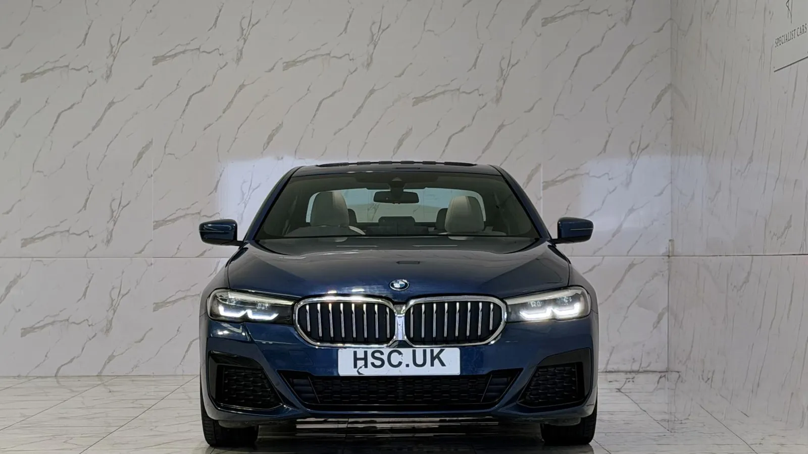 2022 BMW 5 Series — Head-on view of the grille and headlights