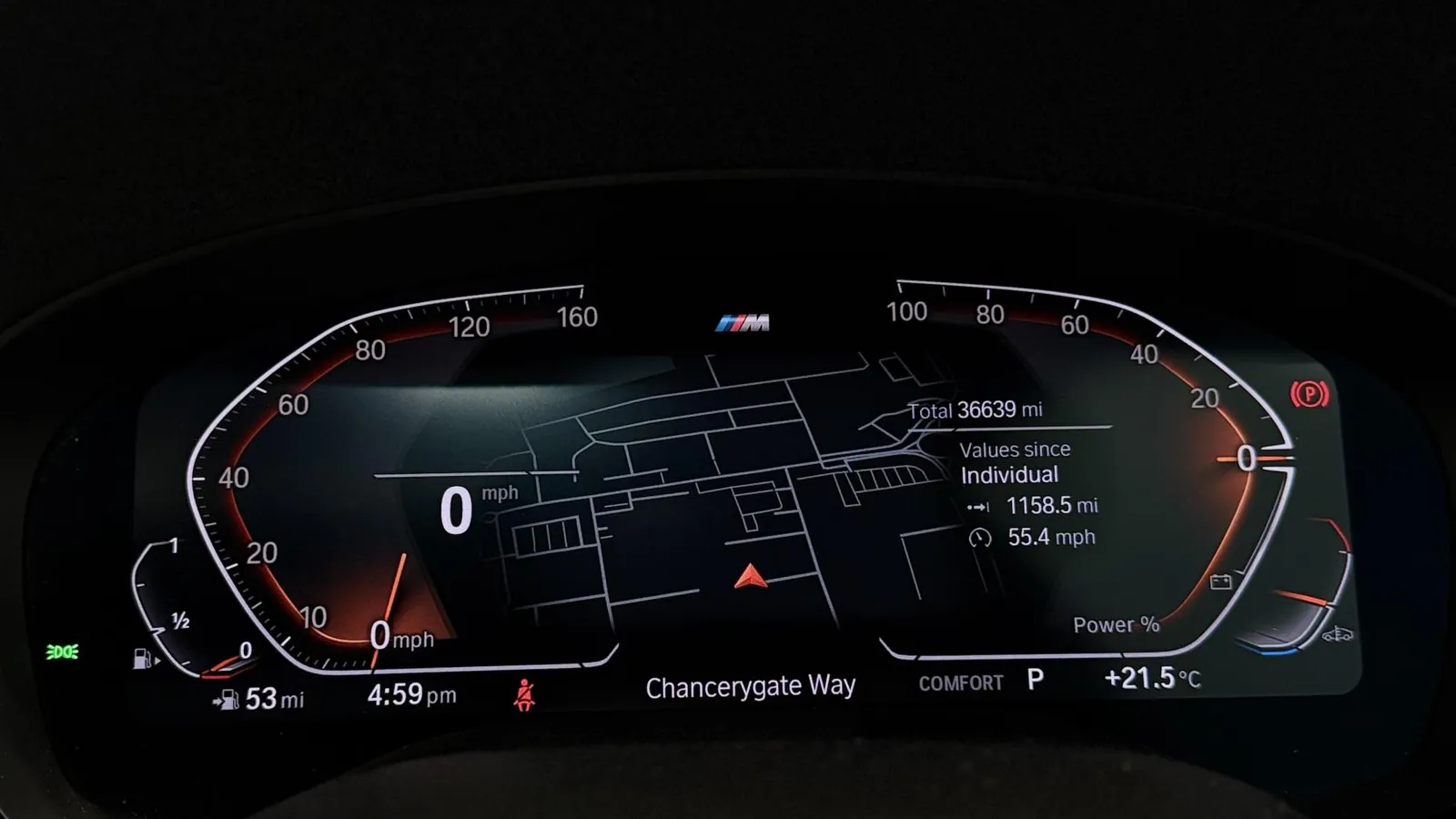 2022 BMW 5 Series — Digital instrument display showing the dials, navigation map and 30,639 miles