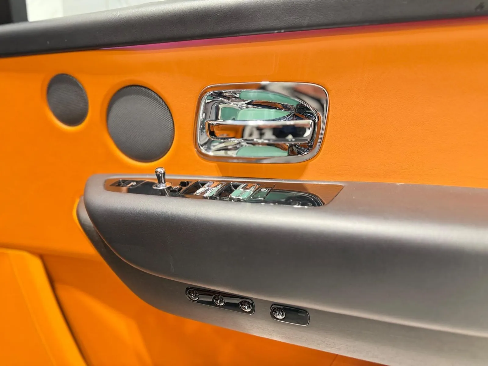 2023 Rolls-Royce Cullinan — Door pull, speaker grille and handle