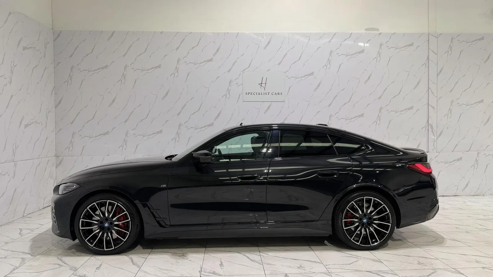 2023 BMW i4 — Full side profile of the Gran Coupe