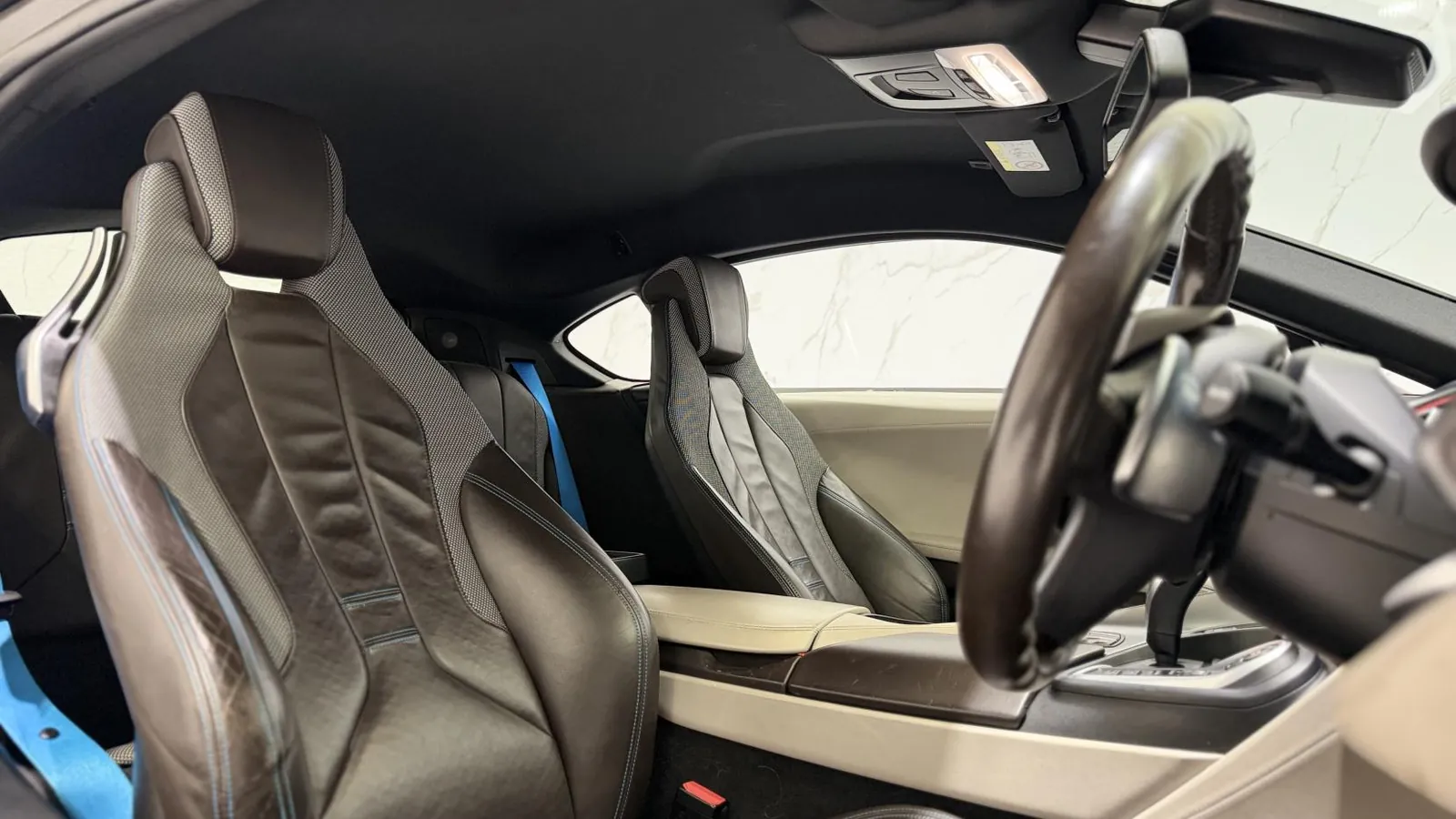 2018 BMW i8 — Cabin looking across the passenger seat to the steering wheel