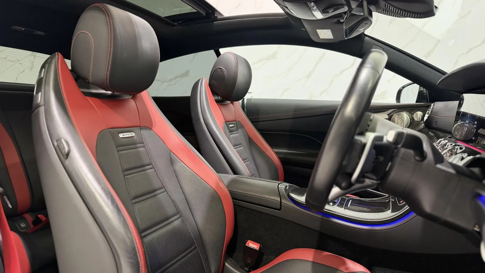 2023 Mercedes-Benz E Class — Cabin looking forward across the front seats to the steering wheel