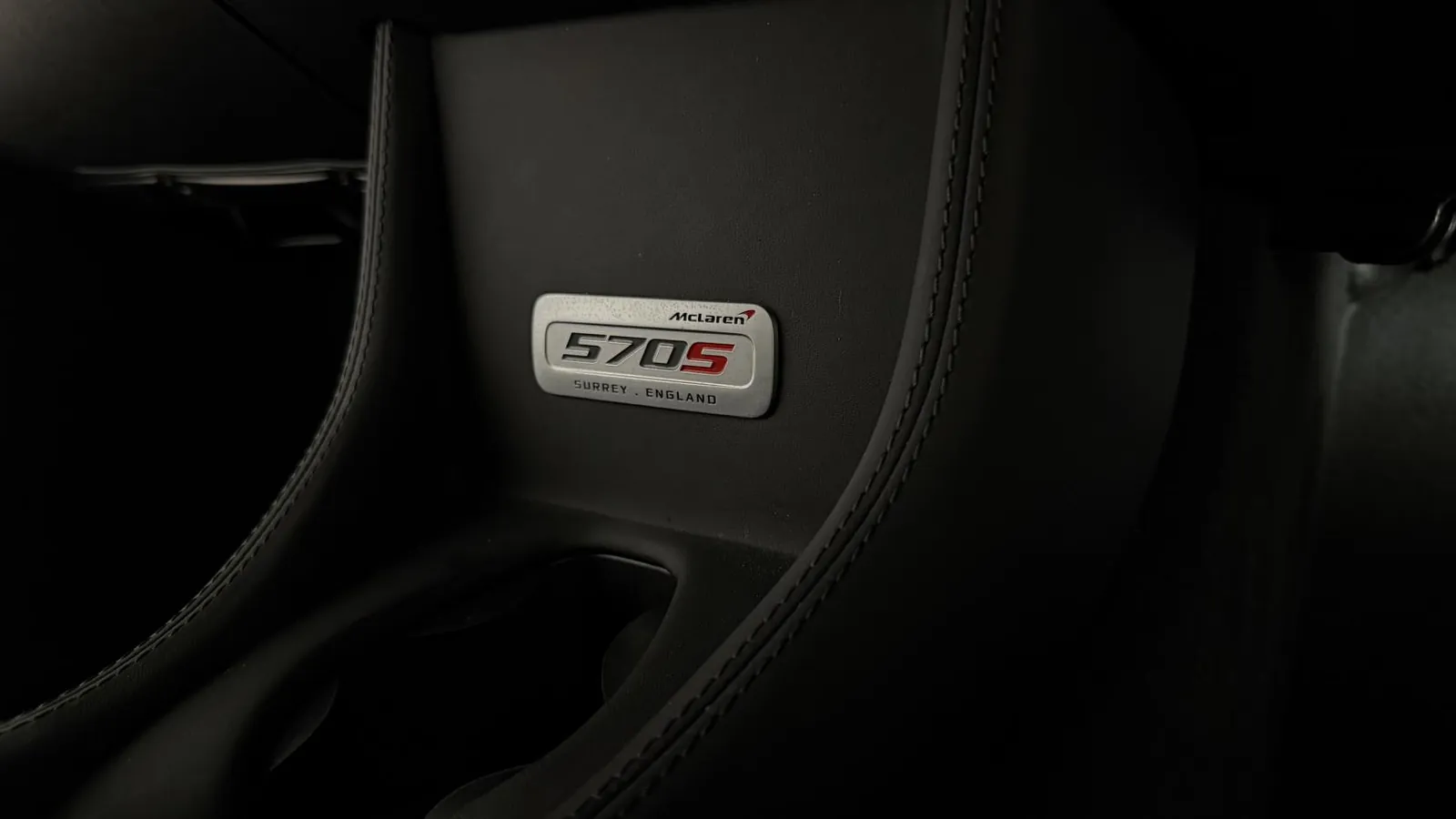 2017 McLaren 570S — Close view of the 570S badge on the door sill