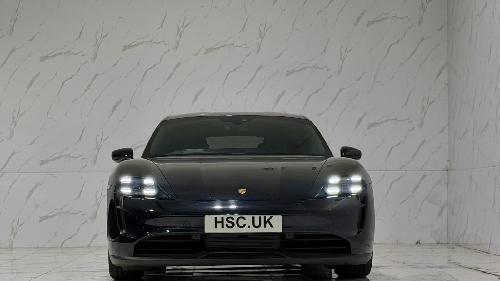 2022 Porsche Taycan — Head-on view of the bonnet and headlights