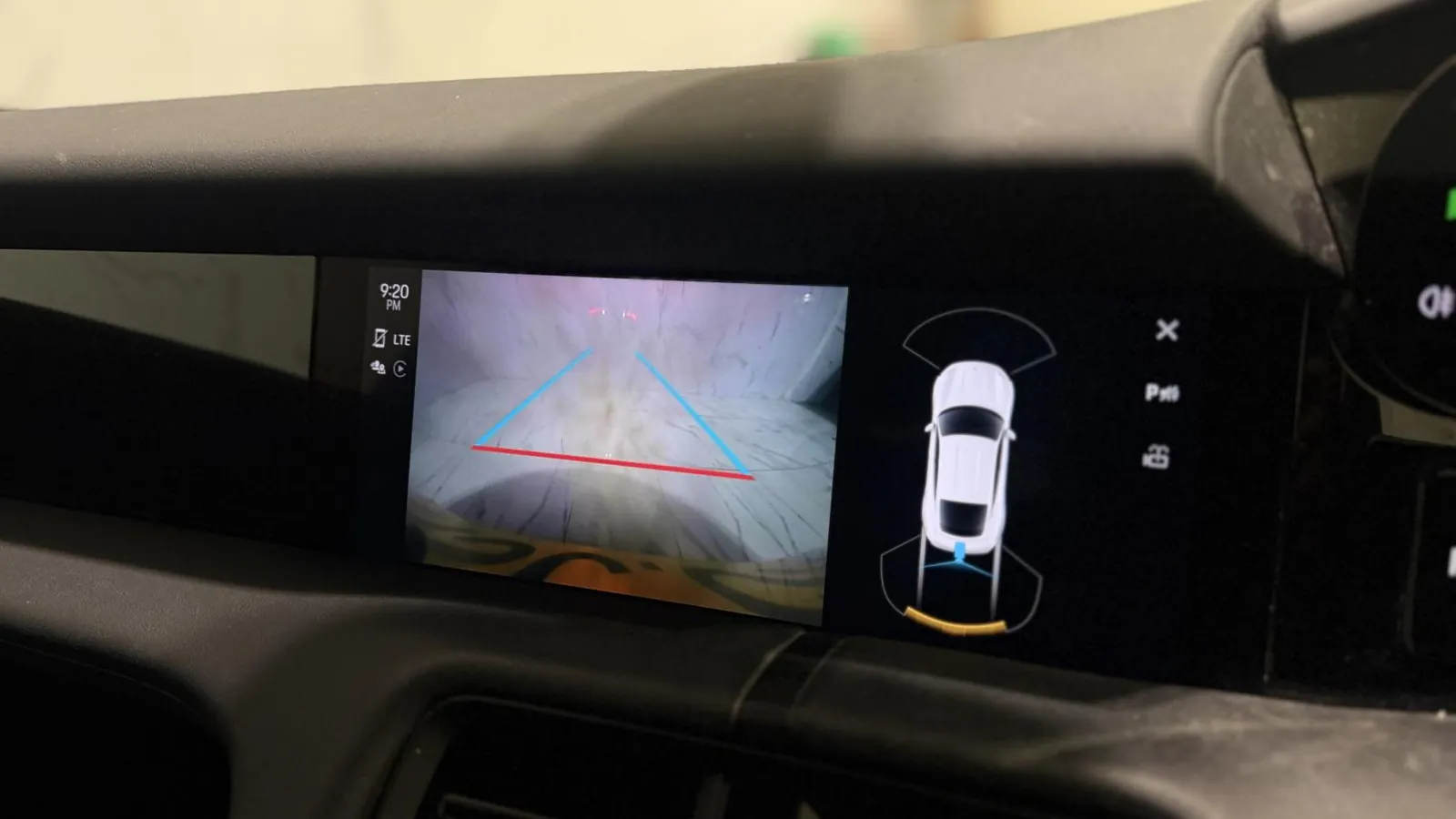 2022 Porsche Taycan — Centre screen showing the reversing camera and overhead view