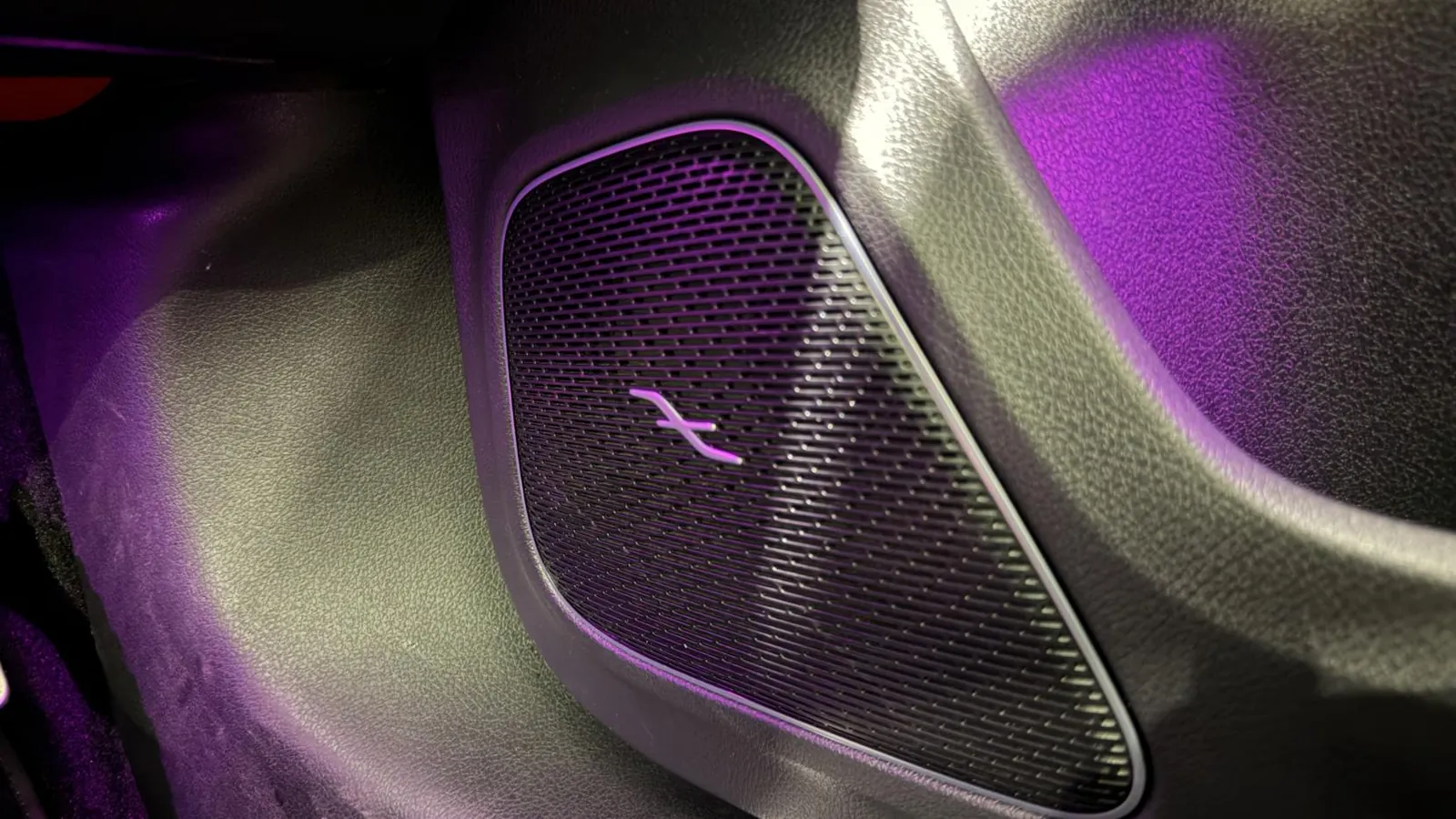 2023 Mercedes-Benz A Class — Close view of a speaker grille with the ambient lighting on