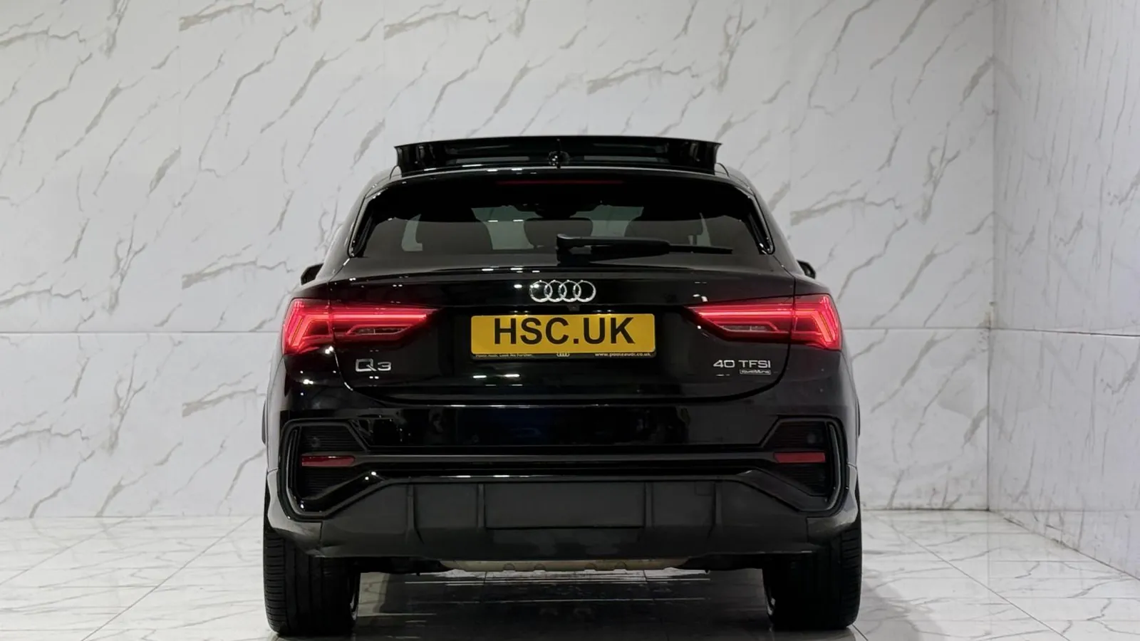 2020 Audi Q3 — Rear view showing the tail lights and lower valance