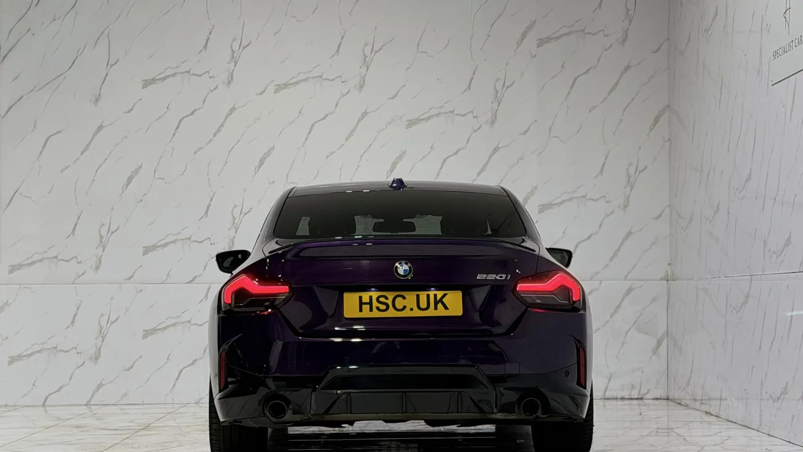 2023 BMW 2 Series — Rear view showing the tail lights and diffuser