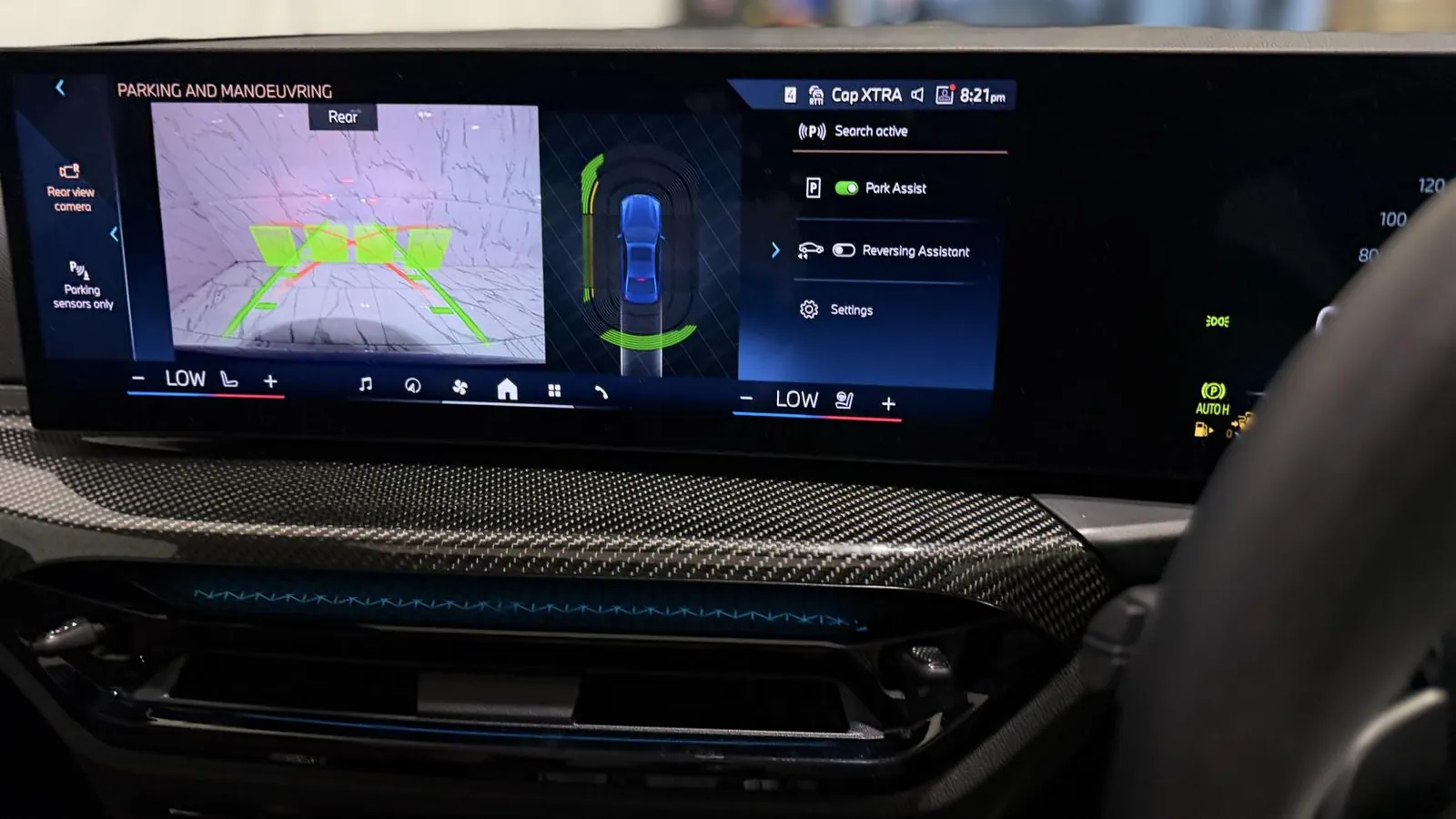 2025 BMW 3 Series — Centre screen showing the parking camera and overhead view