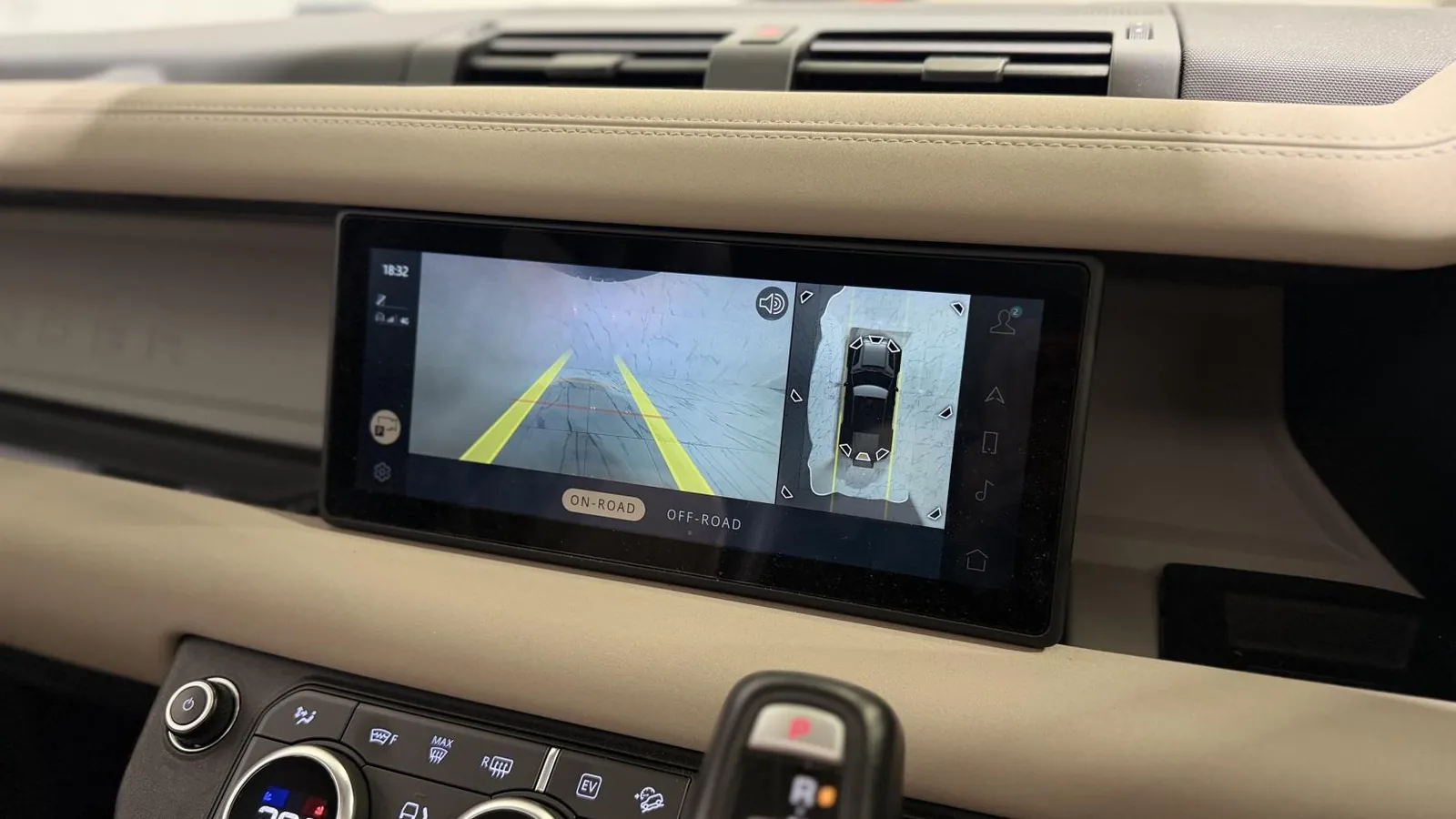 2021 Land Rover Defender 110 — Centre screen showing the parking camera and overhead view