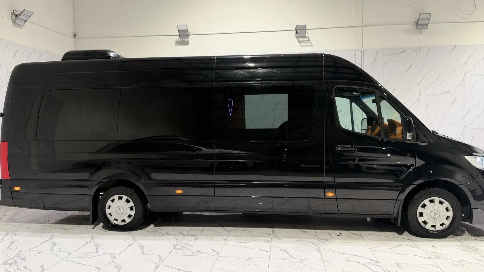 2023 Mercedes-Benz Sprinter — Full side profile of the long-wheelbase Sprinter