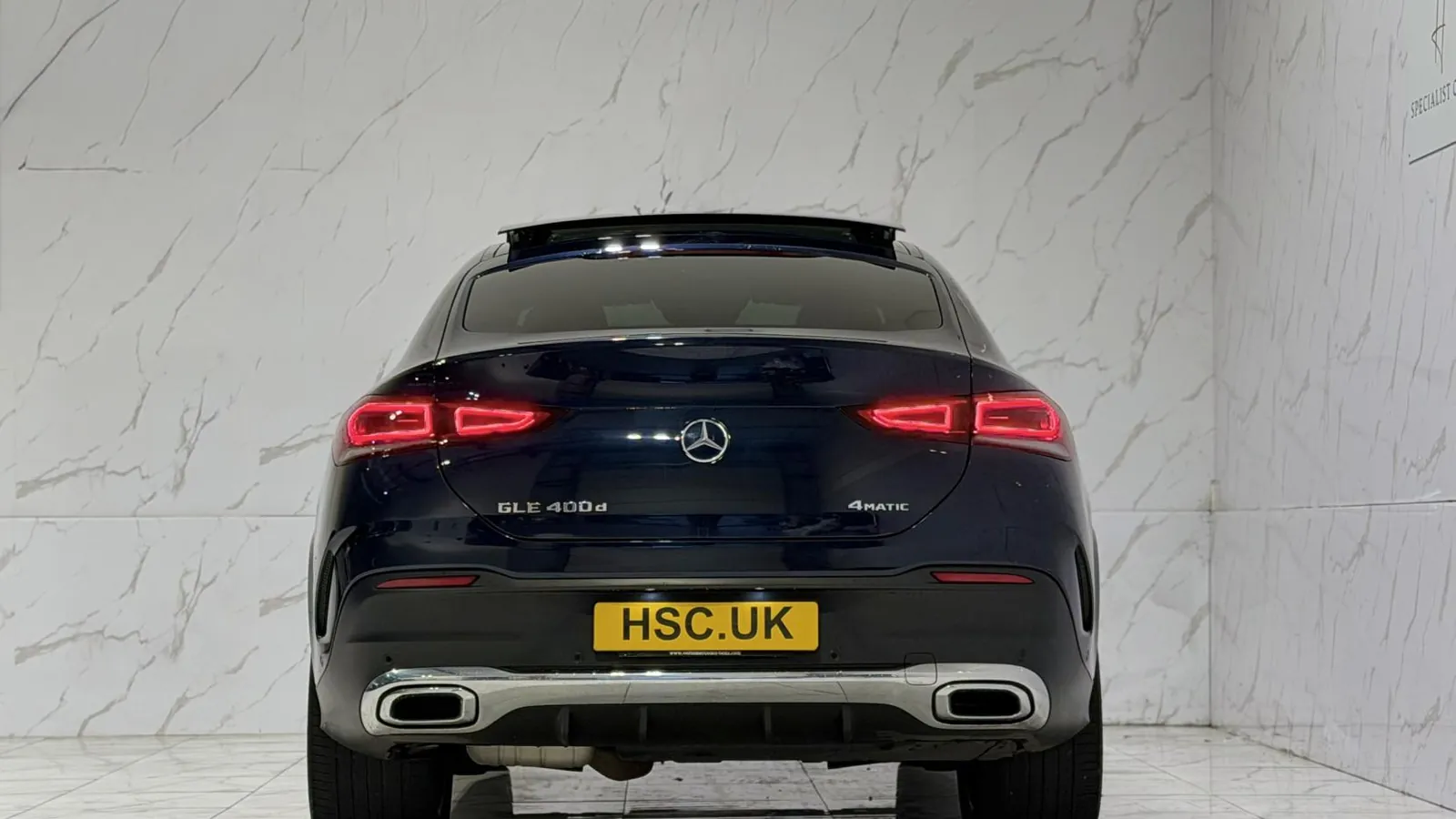 2021 Mercedes-Benz GLE — Rear view showing the tail lights and twin exhaust outlets