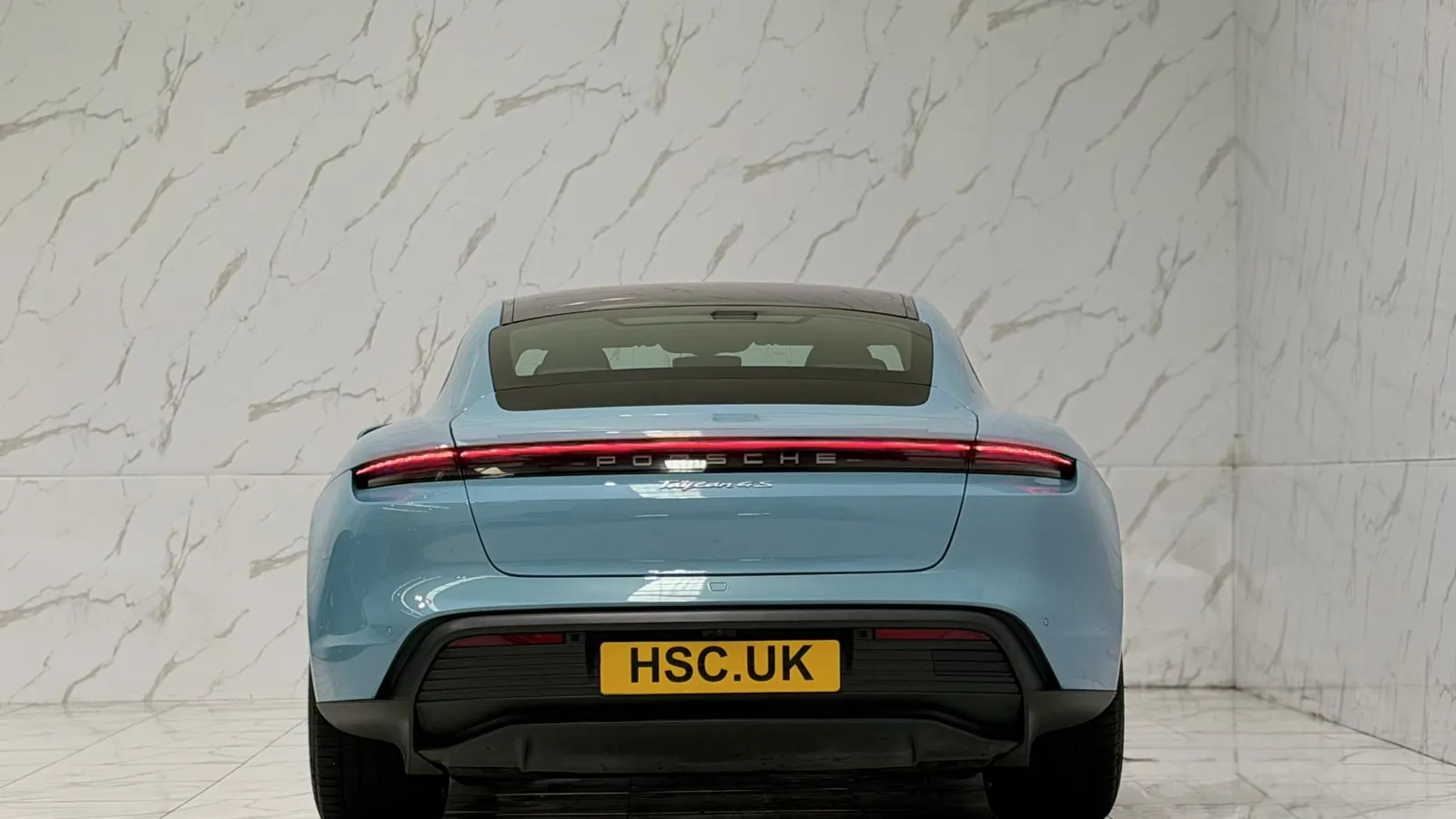 2020 Porsche Taycan — Rear view showing the full-width light bar