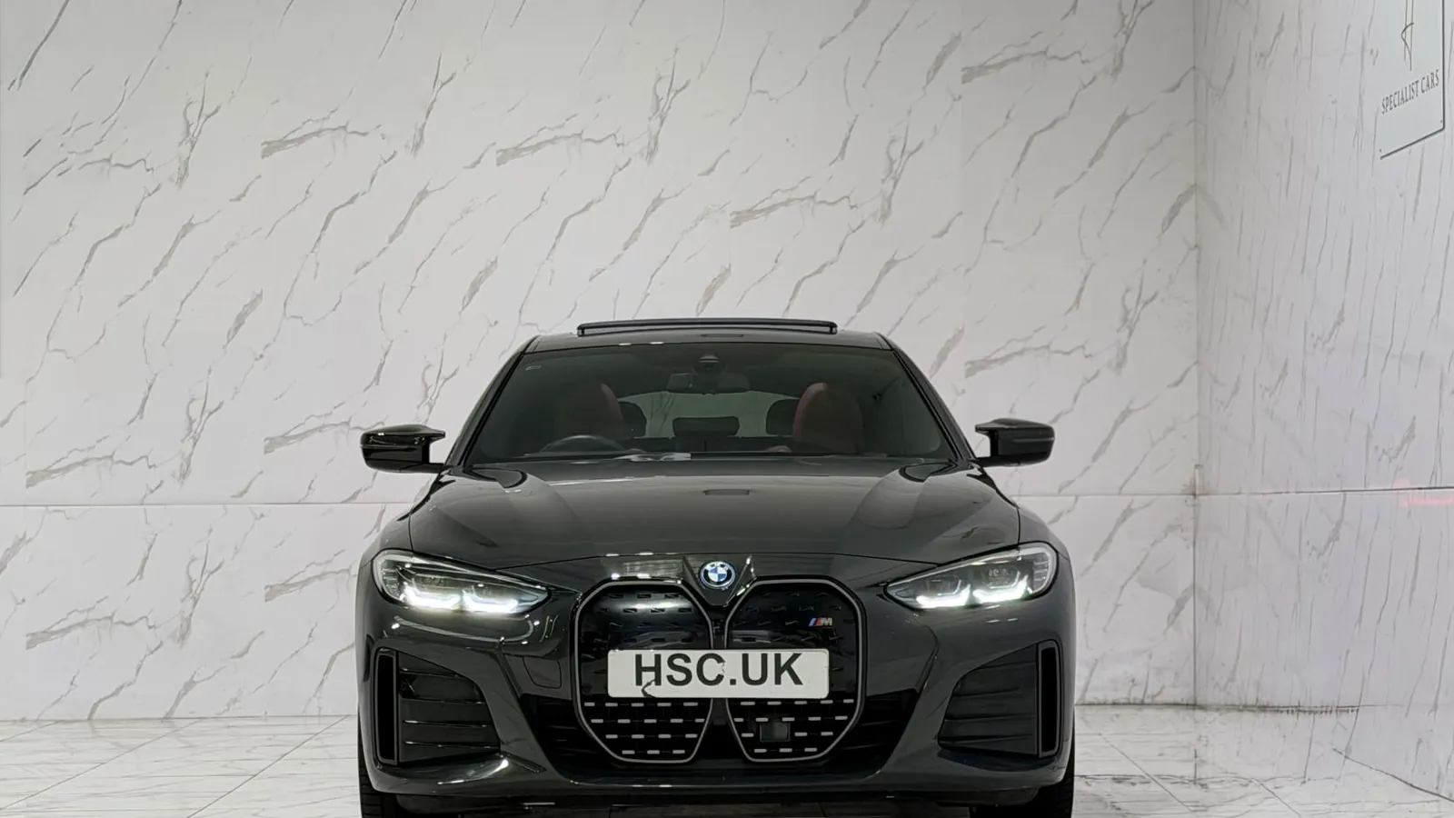 2022 BMW i4 — Head-on view of the grille and headlights