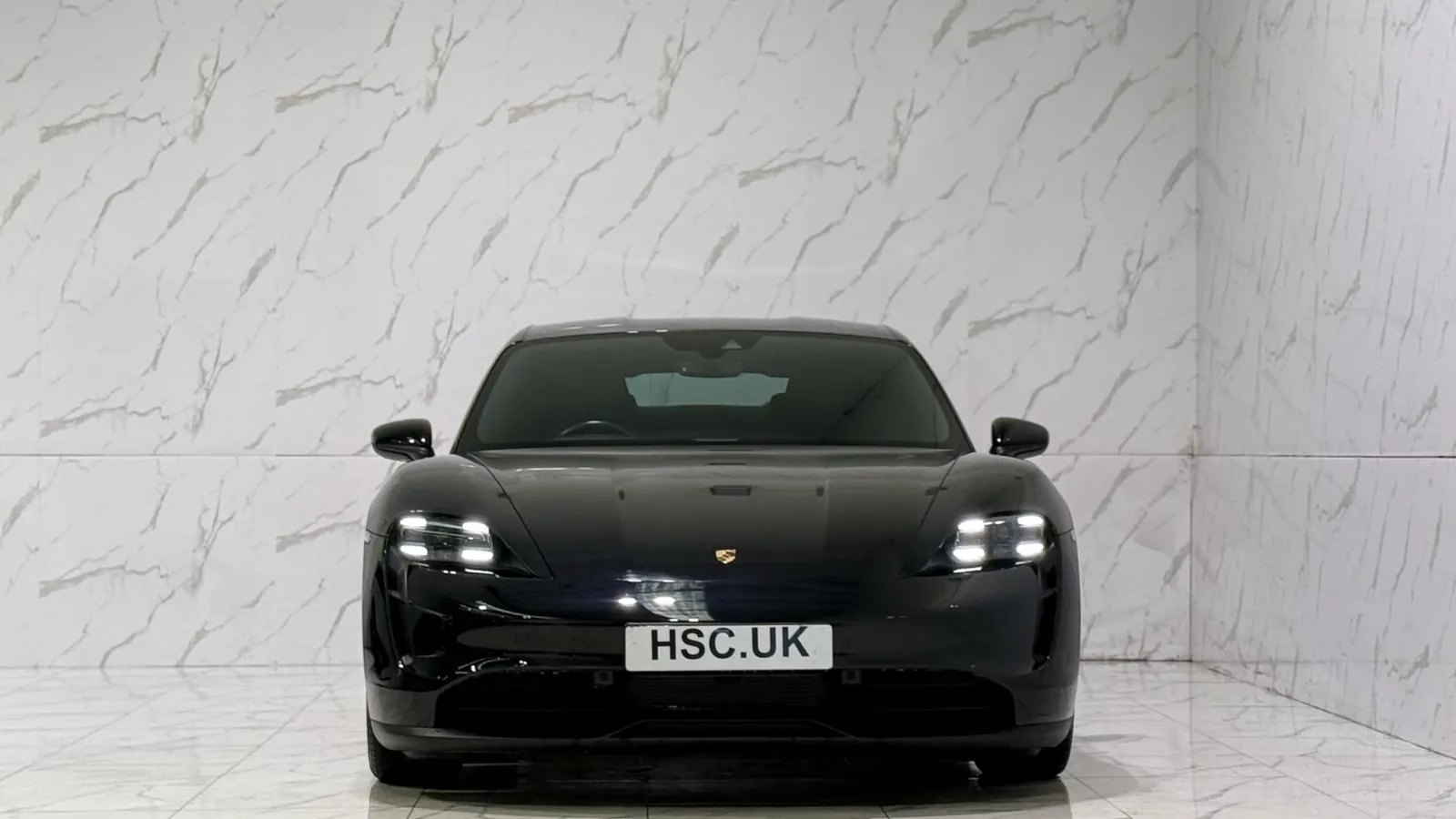 2022 Porsche Taycan — Head-on view of the bonnet and headlights