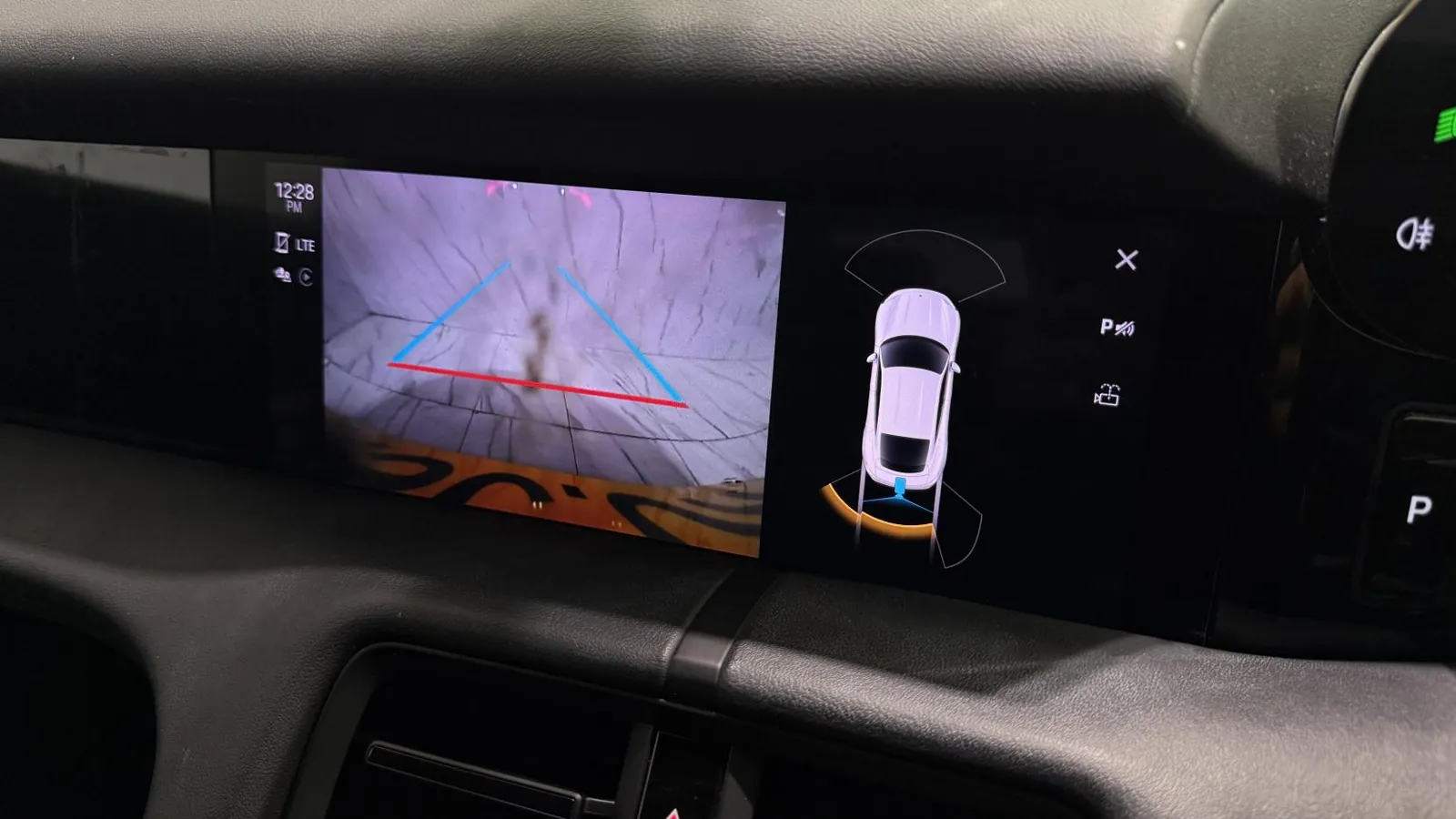 2022 Porsche Taycan — Centre screen showing the reversing camera and overhead view