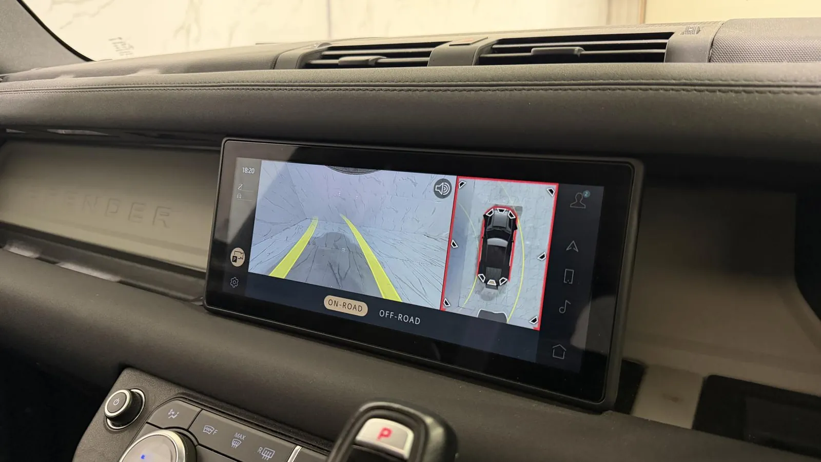 2020 Land Rover Defender 110 — Centre screen showing the parking camera and overhead view