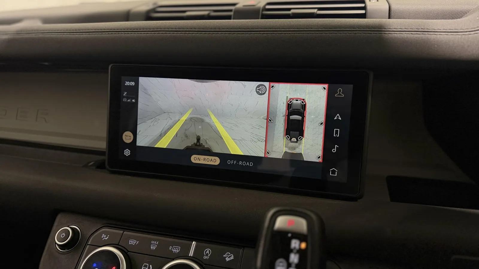 2020 Land Rover Defender 110 — Centre screen showing the parking camera and overhead view