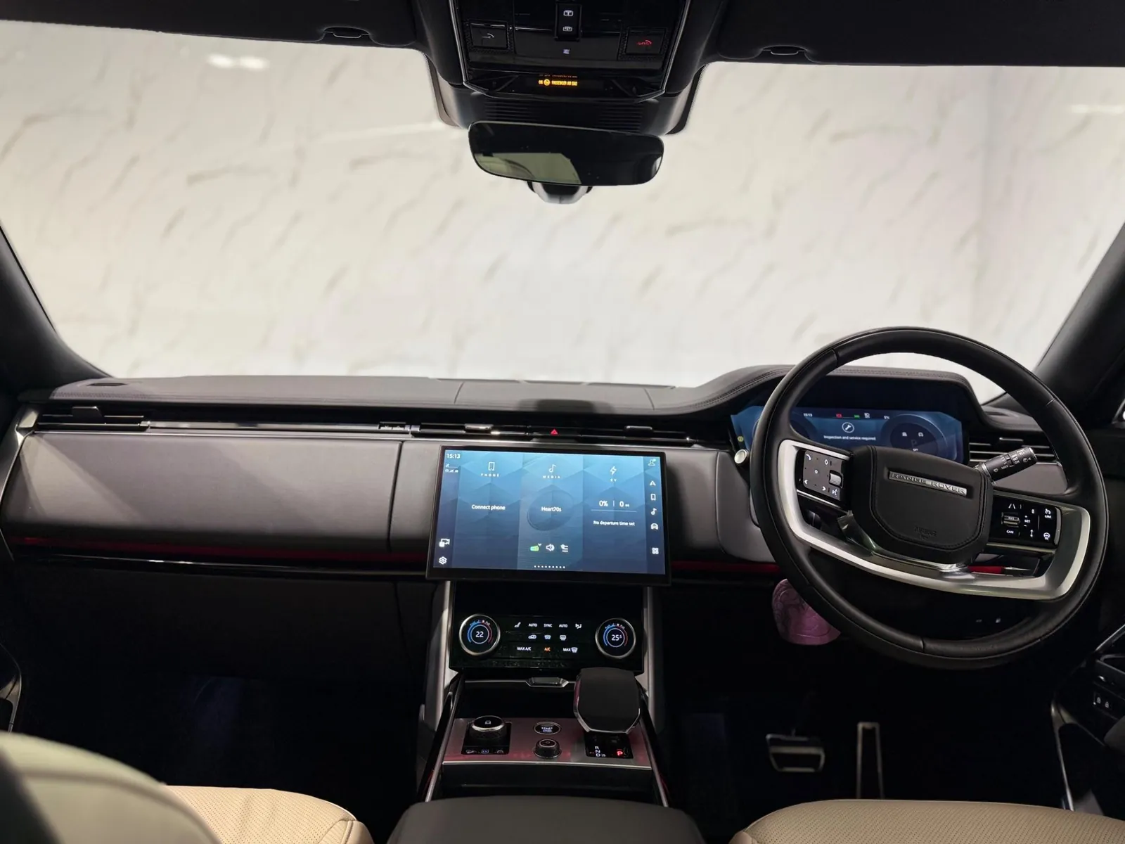 2022 Land Rover Range Rover — Dashboard and centre screen seen from between the front seats