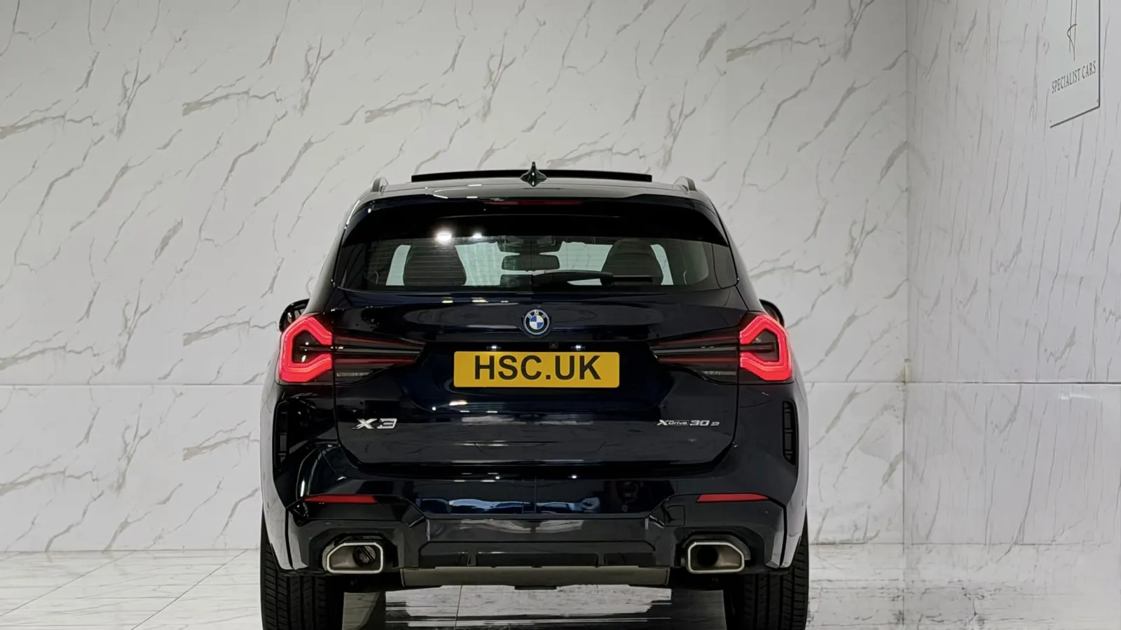 2022 BMW X3 — Rear view showing the tail lights and lower valance