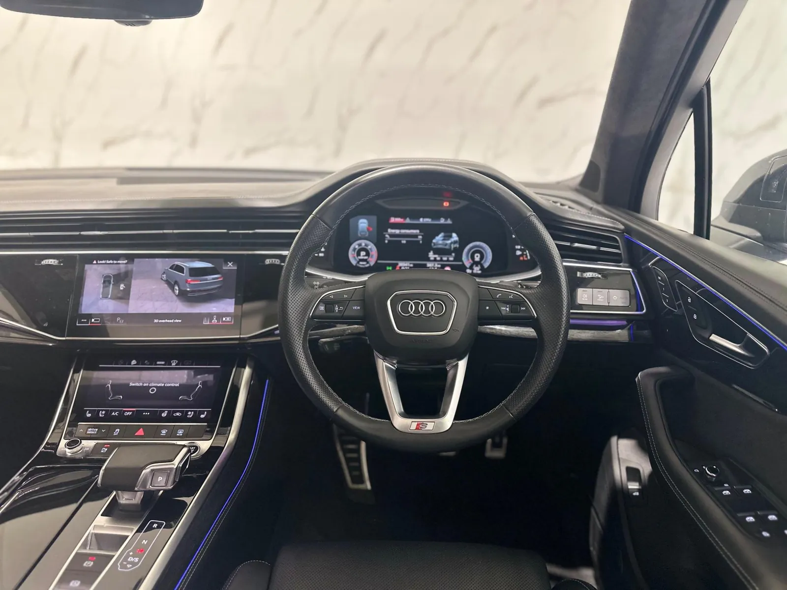2021 Audi Q7 — Dashboard and twin centre screens seen from the passenger side