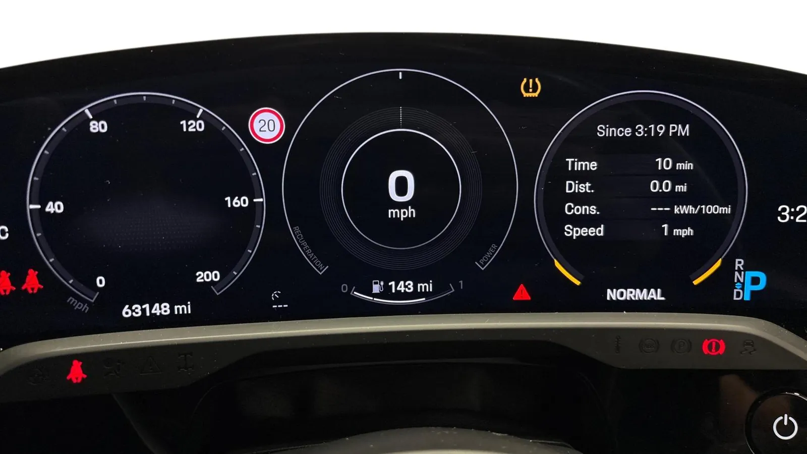 2021 Porsche Taycan — Curved instrument display showing 0 mph and 63,148 miles