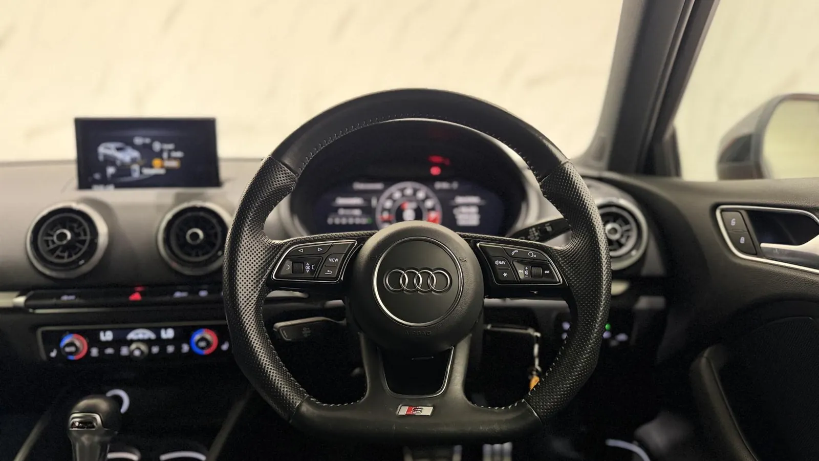 2020 Audi S3 — Steering wheel, dials and centre air vents from the driver's seat