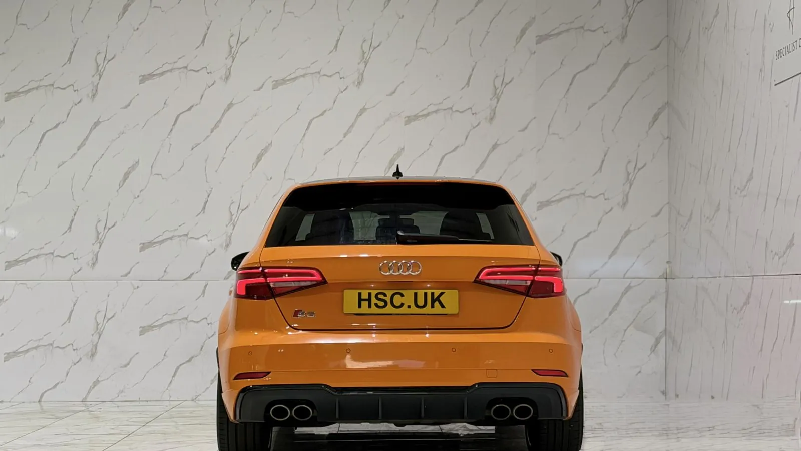 2020 Audi S3 — Rear view showing the tail lights and quad exhaust outlets