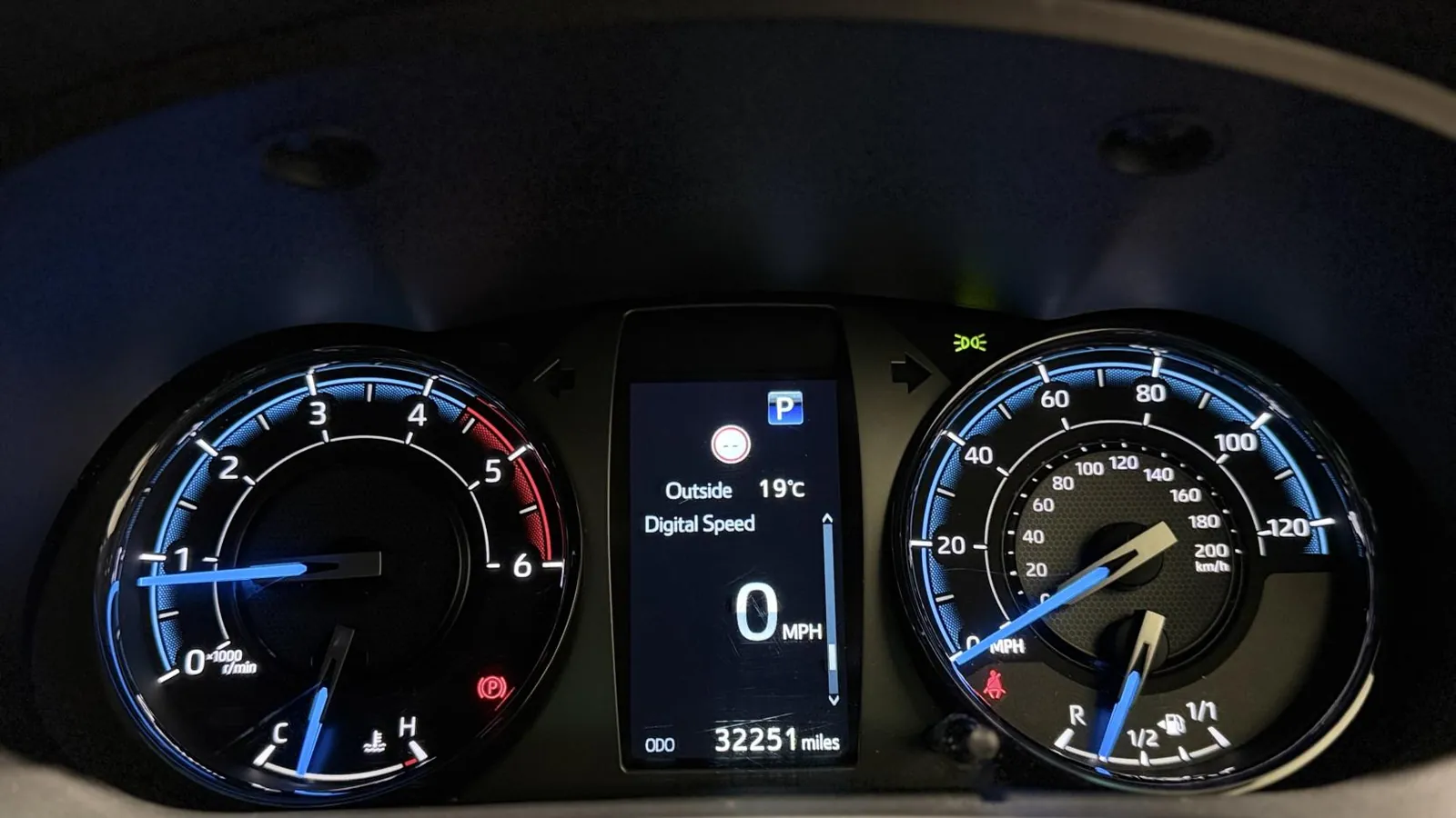 2023 Toyota Hilux — Instrument display showing the dials and 32,251 miles