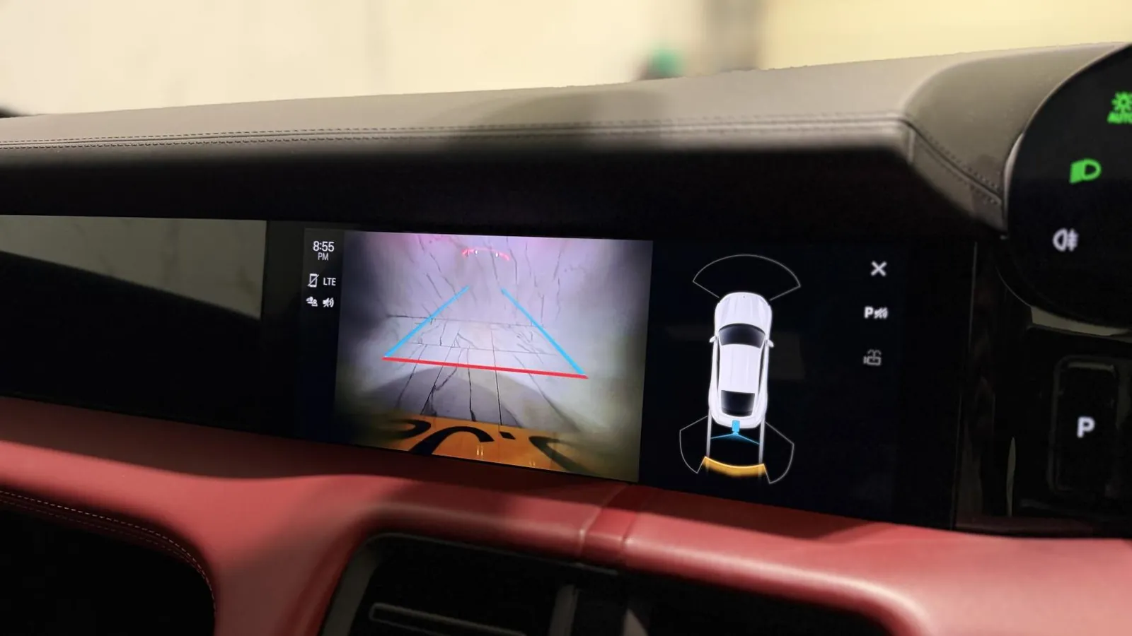 2022 Porsche Taycan — Centre screen showing the reversing camera and overhead view