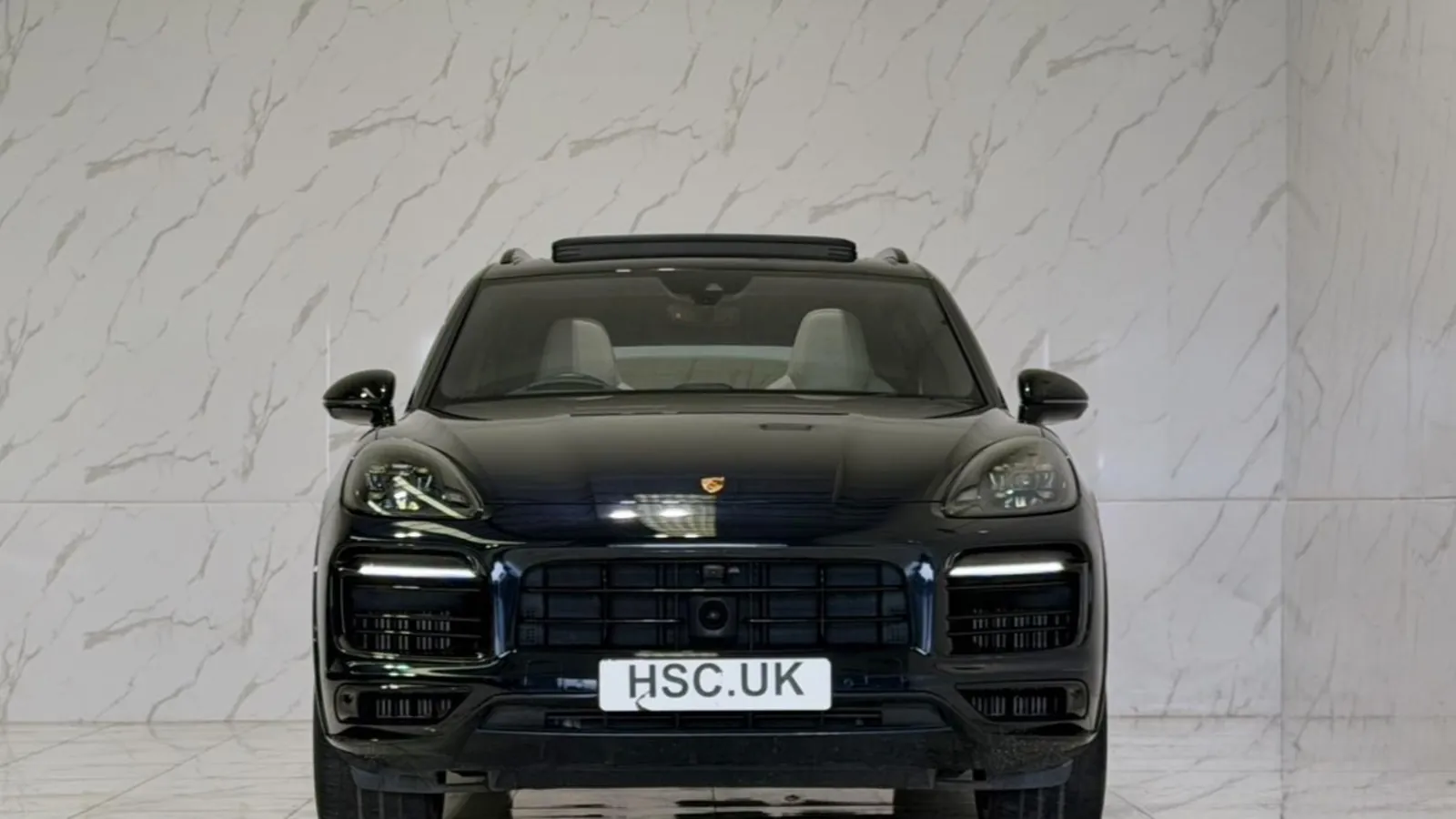 2023 Porsche Cayenne — Head-on view of the grille and headlights