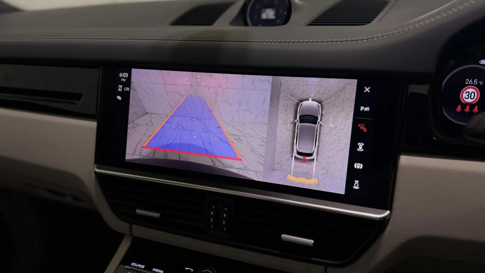 2023 Porsche Cayenne — Centre screen showing the parking camera and overhead view