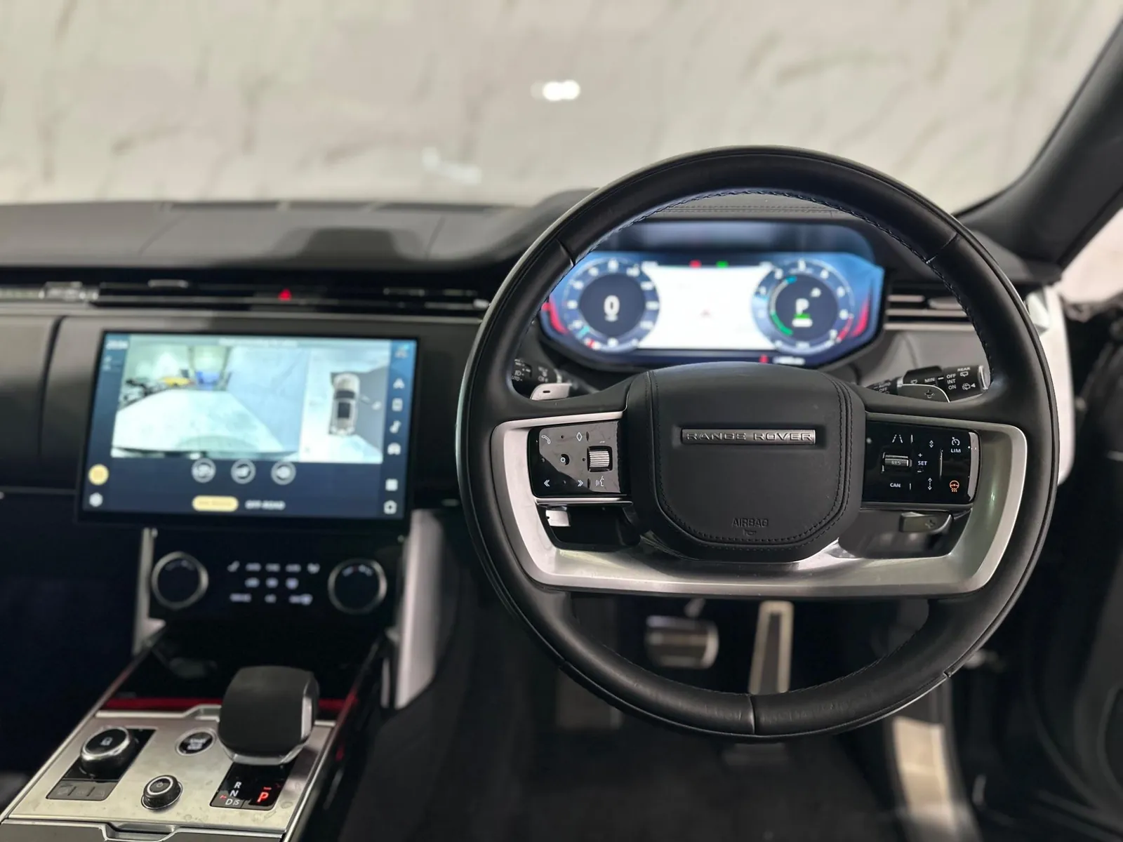 2022 Land Rover Range Rover — Steering wheel, dials and centre screen from the driver's seat